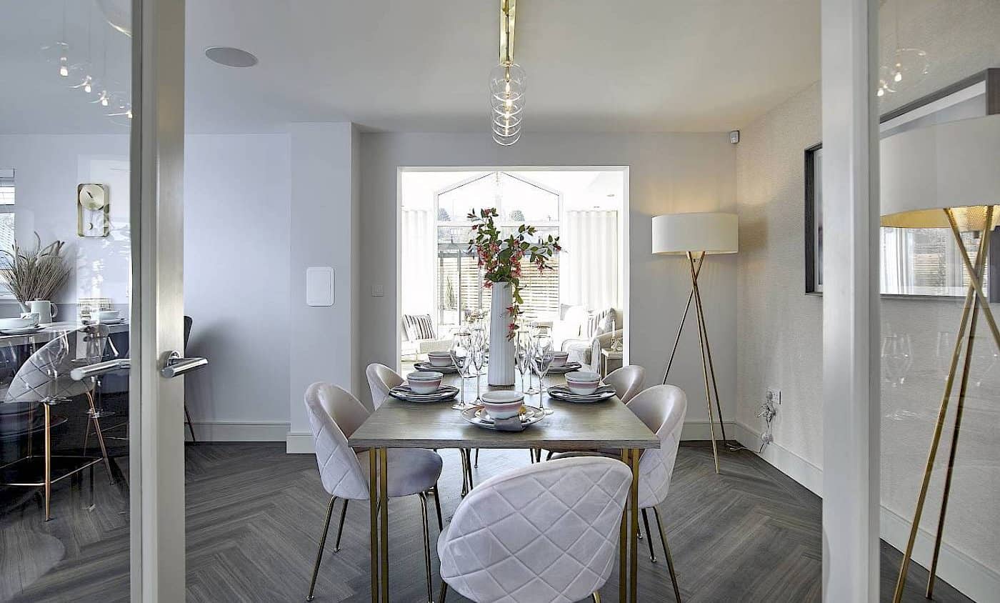 art deco style dining room with gold finishes