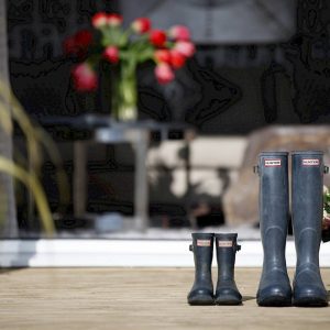 wellington boots placed on deck outdoor space