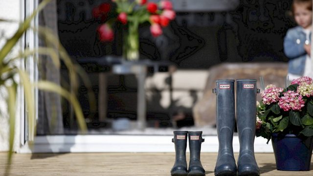 wellington boots placed on deck outdoor space