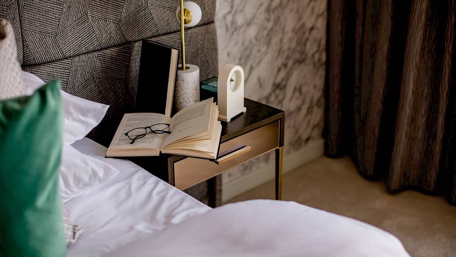 willow cosy bedroom with book on bedside desk