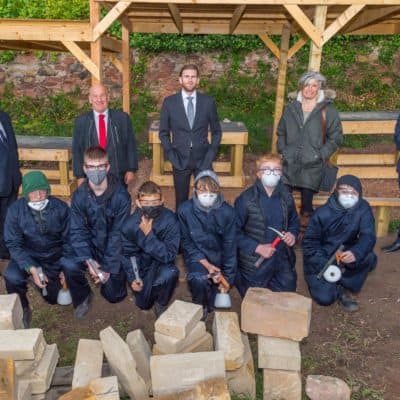 Back row, L to R: John Murphy, MD Robertson Homes; Cllr Norman Hampshire; Gregor Adam, Contracts Manager Robertson Homes; Kate Darragh, MD Ridge Foundation and James Higgins, Robertson Homes Constrution Director. Front Row: Ridge students.